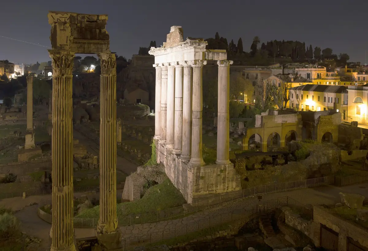 The Temple of Saturn lit at night